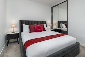 Apartament | 1 dormitori, planxa i posts de planxar i roba de llit