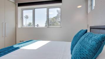 1 bedroom, laptop workspace, bed sheets