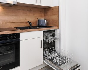 Apartment | Private kitchen - Gemuetliche Ferienwohnung Obergeschoss, Bensersiel (Esens)