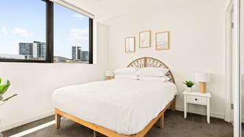 Departamento | 2 habitaciones, tabla de planchar con plancha y ropa de cama