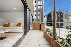 Apartment | Living room - Sophisticated Inner-city 2-bed With Outdoor Dining (Canberra)