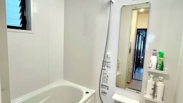 Hair dryer, bidet, towels, soap
