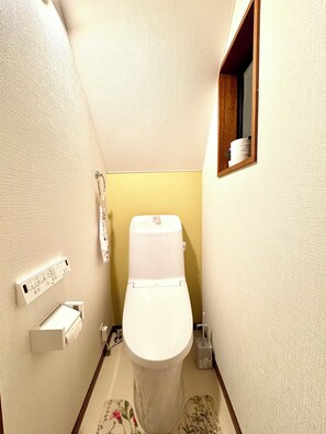 Hair dryer, bidet, towels, soap
