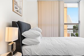 2 bedrooms, laptop workspace, iron/ironing board, bed sheets