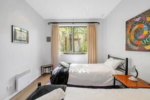 Apartemen | 3 kamar tidur, setrika/meja setrika, dan seprai linen