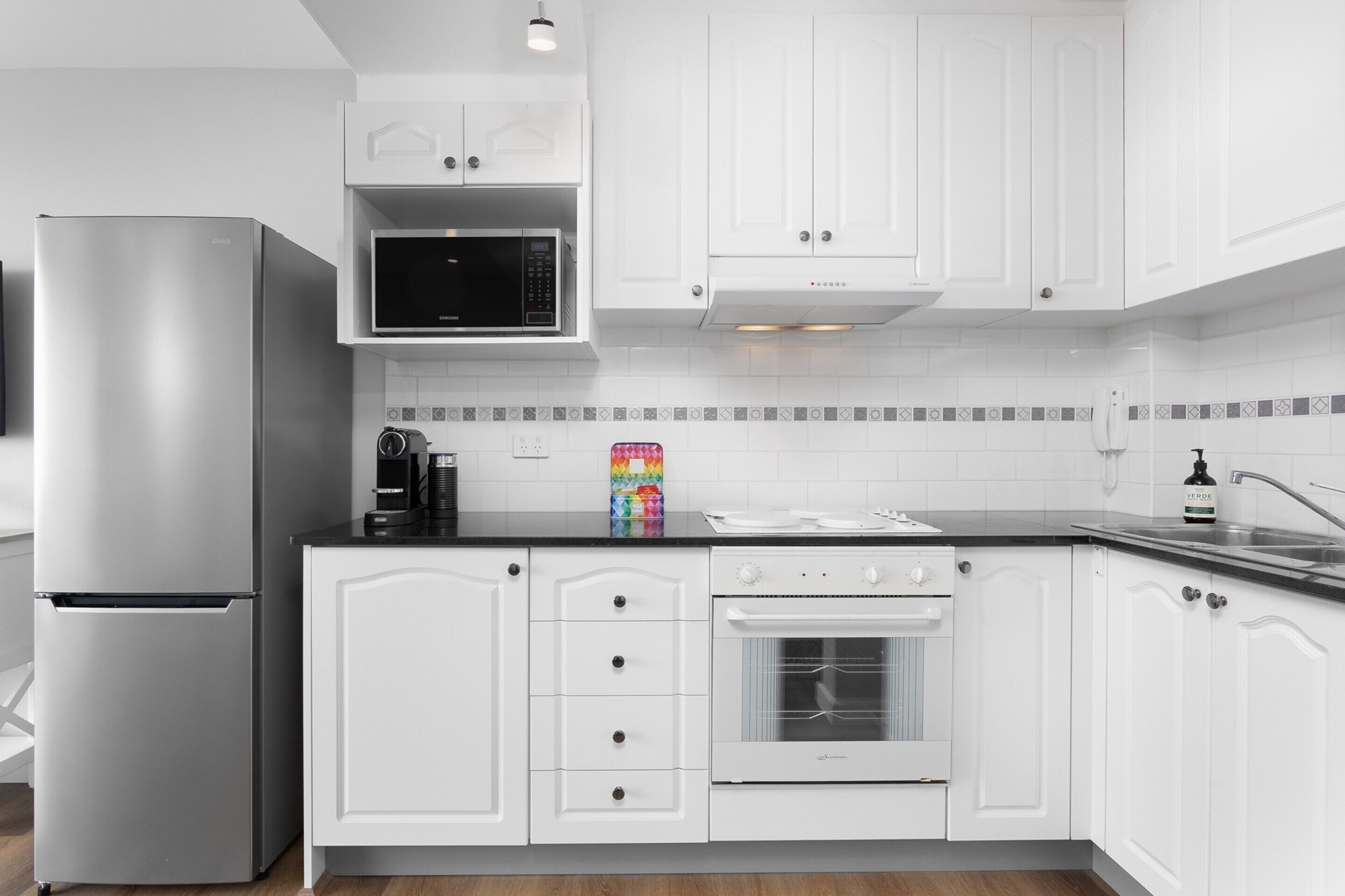 Apartamento | Cozinha privada | Talheres/pratos/utensílios de cozinha