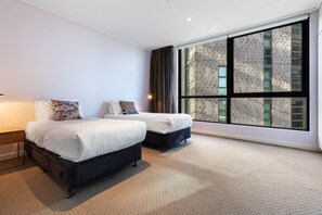 شقة | 2 عدّة غرف نوم ومكواة/لوح كي وملاءات أسرّة