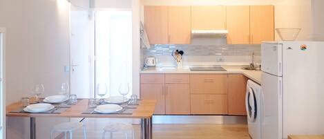 Fridge, stovetop, coffee/tea maker, electric kettle