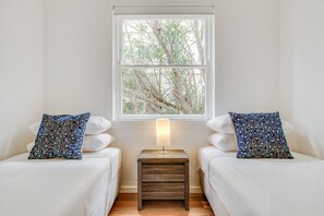 2 bedrooms, laptop workspace, iron/ironing board, bed sheets