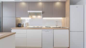 Fridge, stovetop, dishwasher, coffee/tea maker