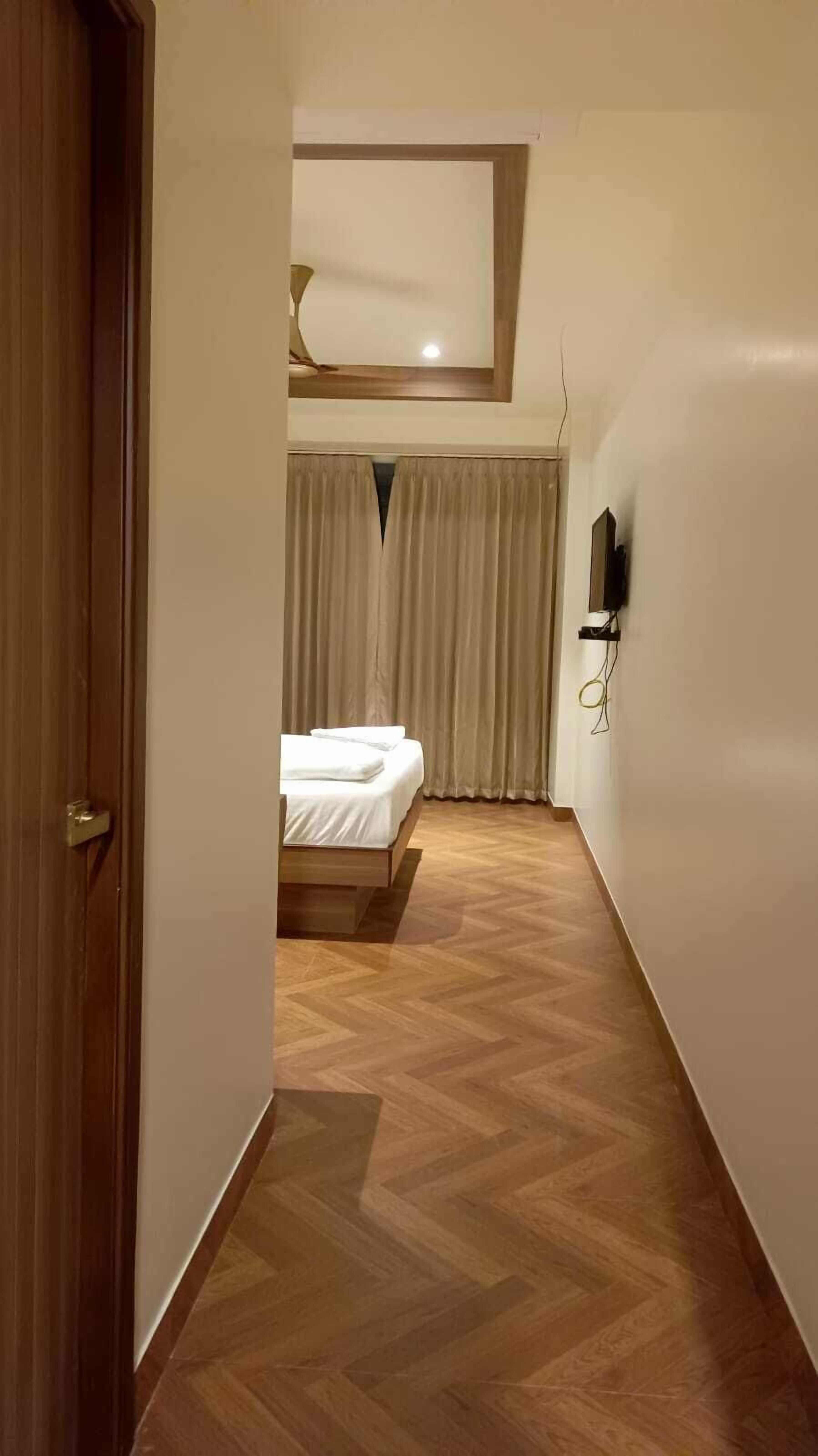 Luxury Double Room, City View | In-room safe, desk, laptop workspace, blackout drapes