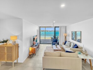 Apartment | Living room - 3-bed: Riverfront Alfresco Dining & Rooftop Pool (Batemans Bay)