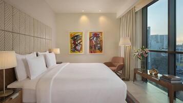 Premium bedding, memory foam beds, free minibar, in-room safe