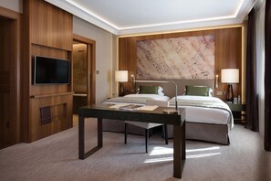 Premium bedding, memory-foam beds, free minibar, in-room safe