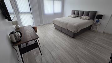 Chambre Confort | Espace de travail pour ordinateur portable, Wi-Fi gratuit