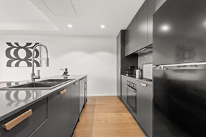 Apartment | Private kitchen | Cookware/dishes/utensils - Stylish 2-bed in Braddon With Alfresco Dining (Canberra)
