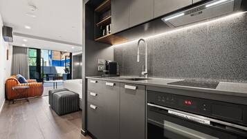 Apartment | Private kitchen | Fridge, microwave, oven, stovetop