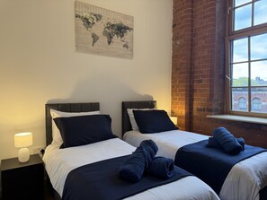 2 habitaciones, tabla de planchar con plancha y wifi gratis 