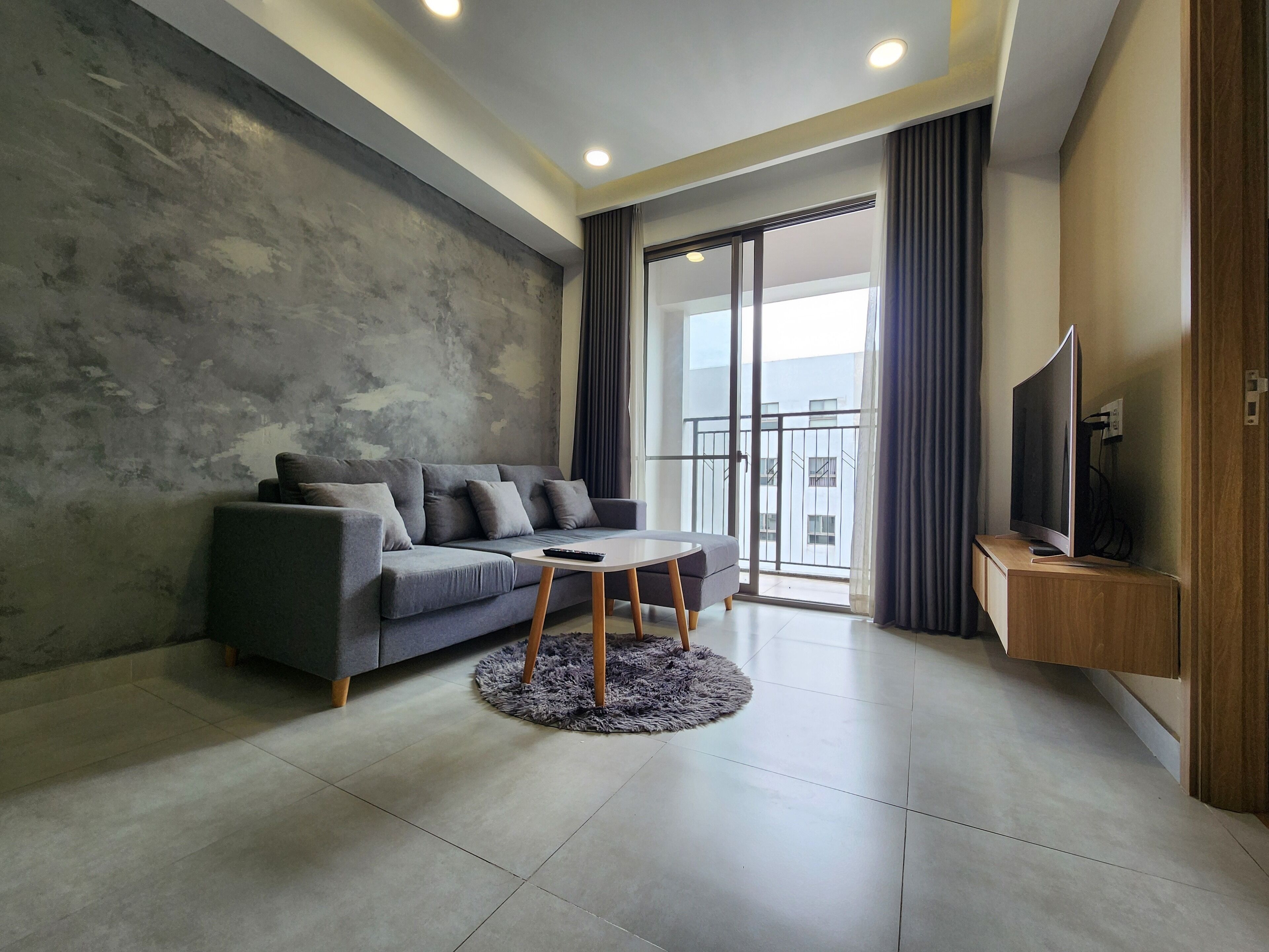 Premier Apartment, Balcony, Garden View | Living area | 65-inch Smart TV with digital channels, fireplace, Netflix