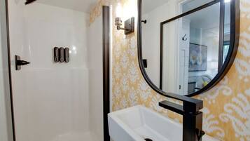 Hair dryer, towels, soap, shampoo