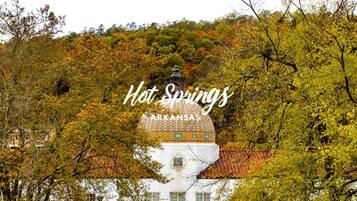 A building with a dome and a sign that reads 'Hot Springs Arkansas.'