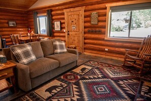 TV - Spacious Pet-Friendly Log Cabin with King Bed & Full Kitchen | Bonners Ferry, Idaho Retreat (Bonners Ferry)