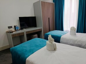 In-room safe, desk, laptop workspace, blackout curtains