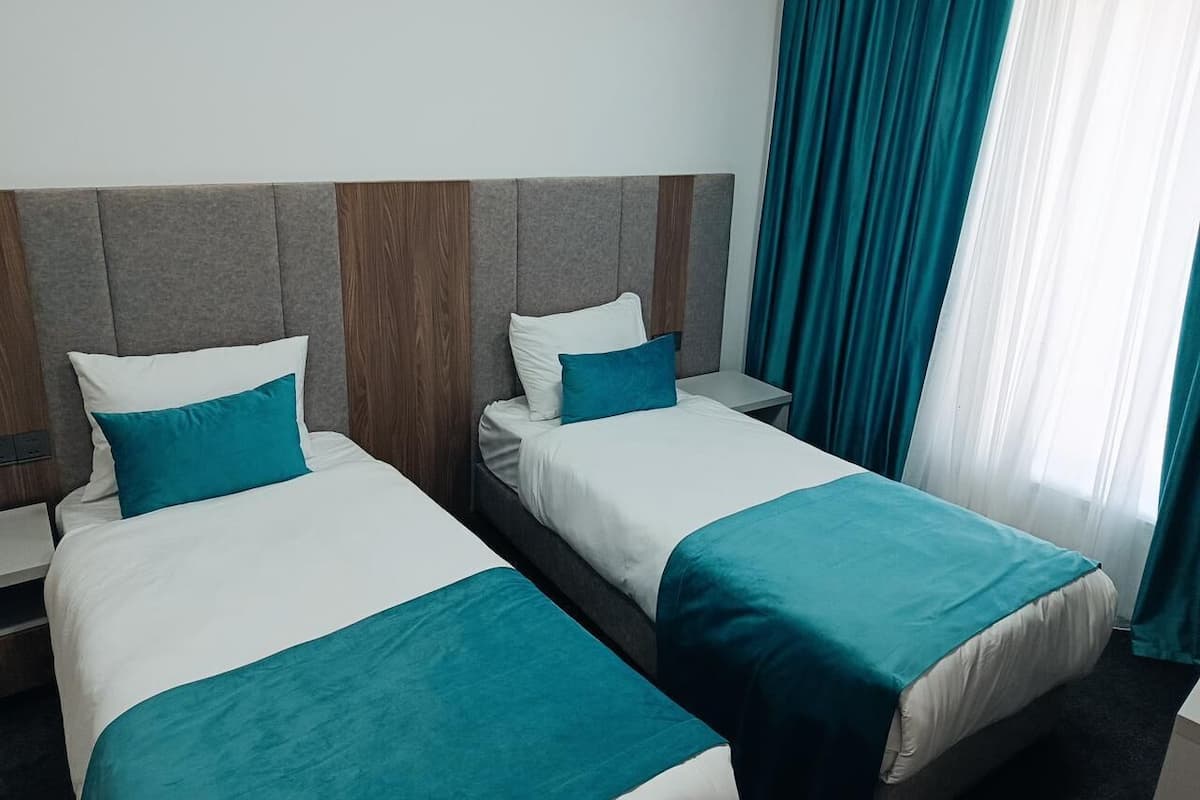 In-room safe, desk, laptop workspace, blackout curtains