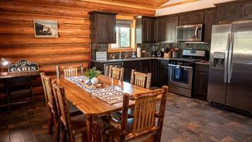 Fridge, stovetop, dishwasher, coffee/tea maker