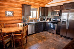 Fridge, stovetop, dishwasher, coffee/tea maker