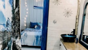 1 bedroom, desk, iron/ironing board, travel crib