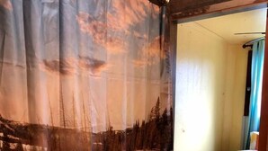 1 bedroom, desk, iron/ironing board, travel crib
