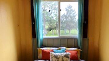 1 bedroom, desk, iron/ironing board, travel crib