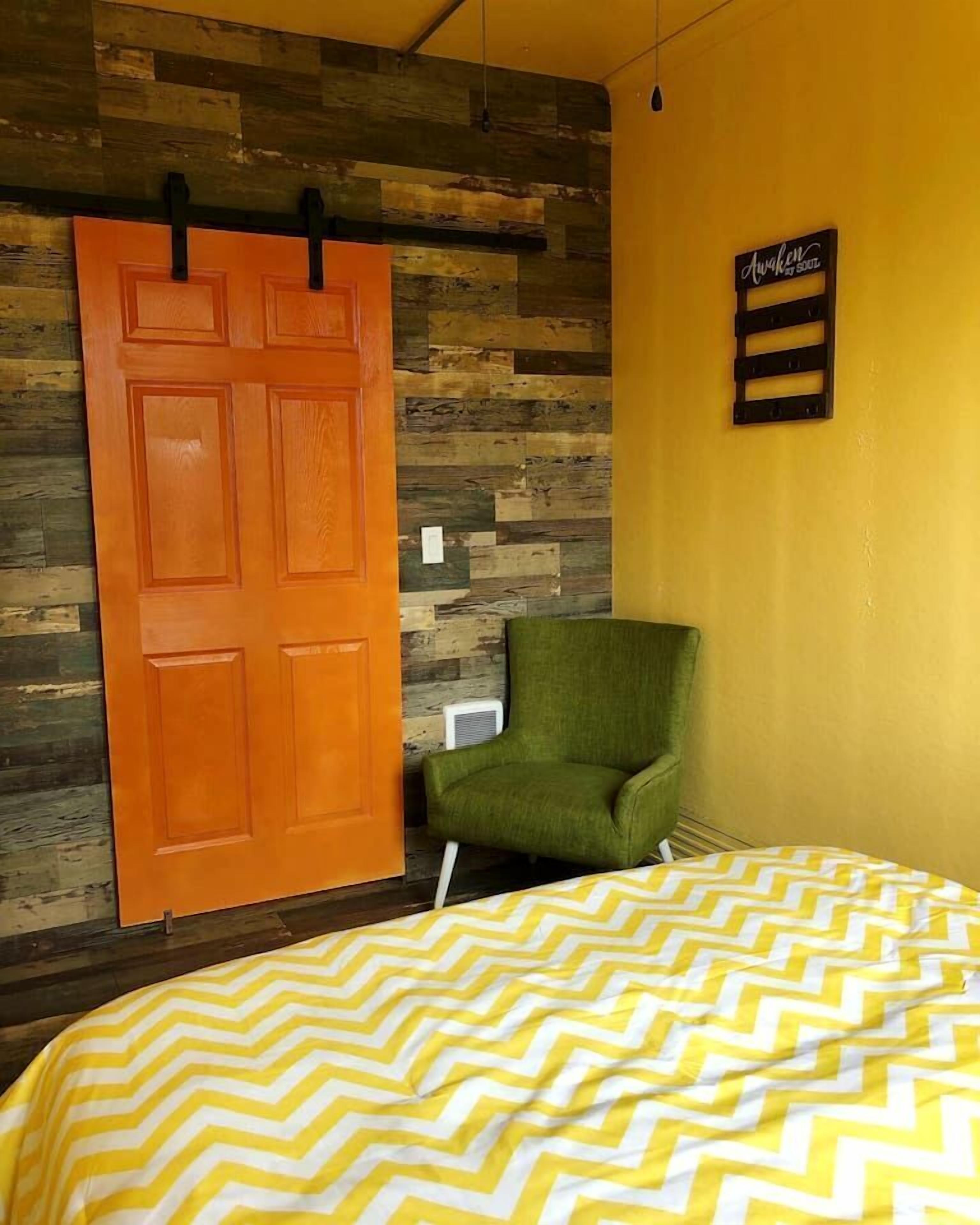 1 bedroom, desk, iron/ironing board, travel crib