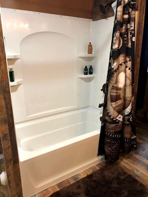 Jetted tub, hair dryer, soap, shampoo