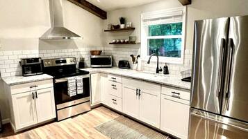 Fridge, microwave, stovetop, coffee/tea maker