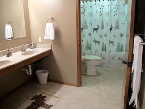 Jetted bath, hair dryer, towels, soap