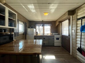 Fridge, microwave, stovetop, coffee/tea maker - Beautiful Cabin with Nice Lake Vistas in Portage Lake, Maine (Portage Lake)