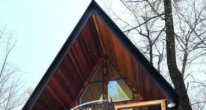 Eco-Friendly Solar Powered A-Frame Treehouse with Hot Tub and Private Dock on Littlefield Pond, near Wells, Maine