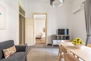 Apartment, 2 Bedrooms, Balcony | Living area | 30-inch TV with satellite channels - Casa Markea by Wonderful Italy (Palermo)