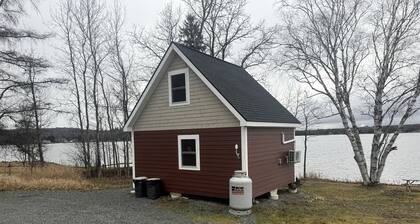 Magnificent Cabin Nestled Amidst Trees in Portage Lake, Maine