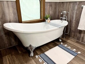 Jetted bath, hair dryer, towels, soap