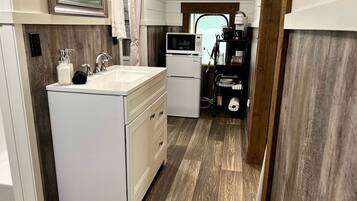 Fridge, coffee/tea maker, cookware/dishes/utensils