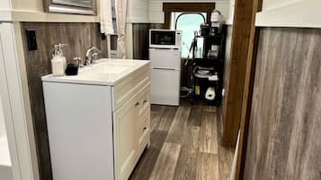 Fridge, coffee/tea maker, cookware/dishes/utensils