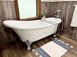 Jetted bath, hair dryer, towels, soap