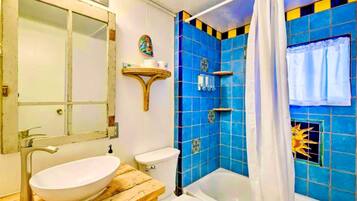 Hair dryer, towels, soap, shampoo