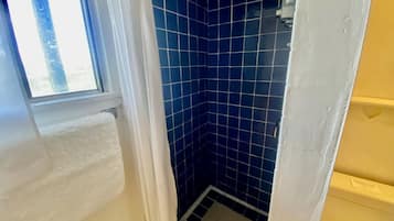 Hair dryer, towels, soap, shampoo