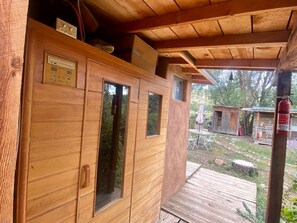 Exterior detail - Petite Log Cabin on Organic Farm in New Mexico (San Cristobal)
