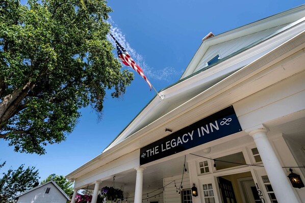 A building with a sign reading 'The Legacy Inn.'
