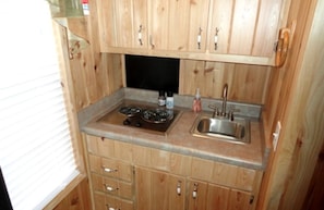 Fridge, microwave, stovetop, coffee/tea maker